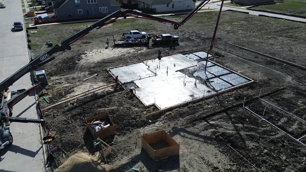 Pumping a residential foundation (aerial)