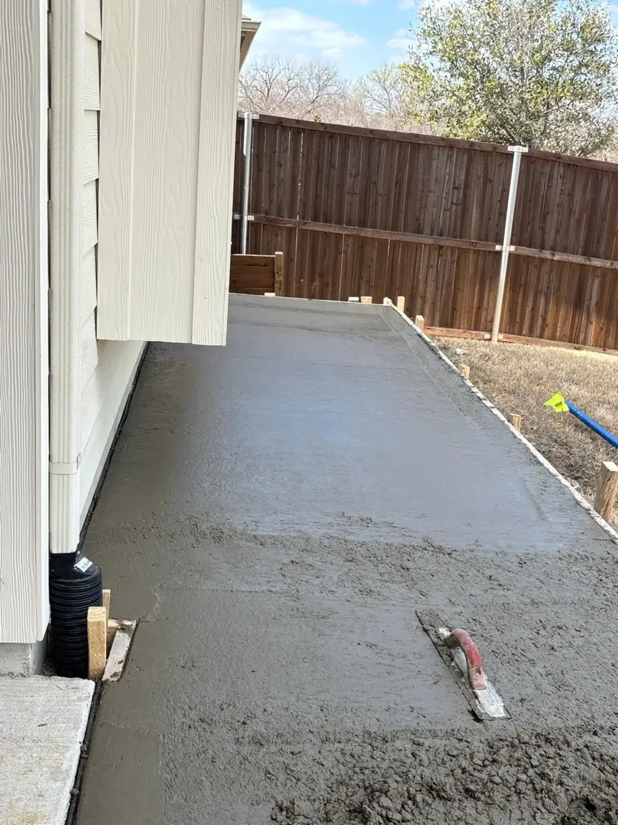 Freshly finished slab beside a home
