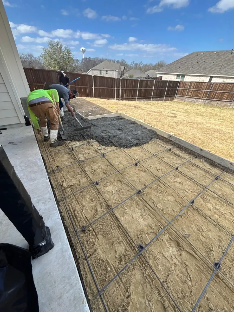 Placing concrete over rebar (in progress)