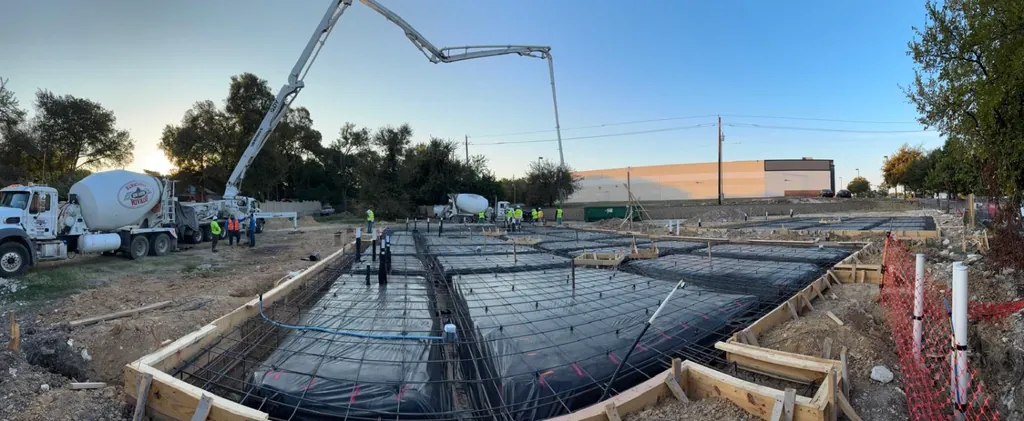 Commercial slab preparation with a pump boom (panorama)