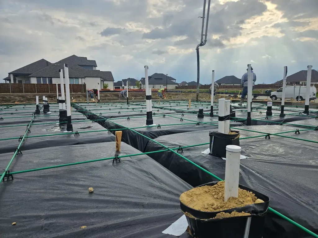Plumbing sleeves and tendons set before a pour