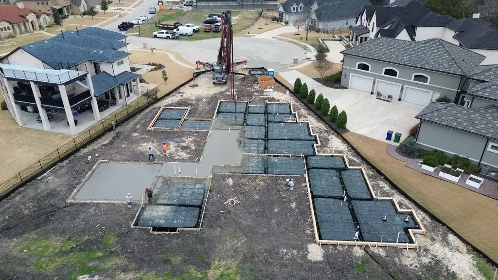 Foundation forms ready in a subdivision (aerial)