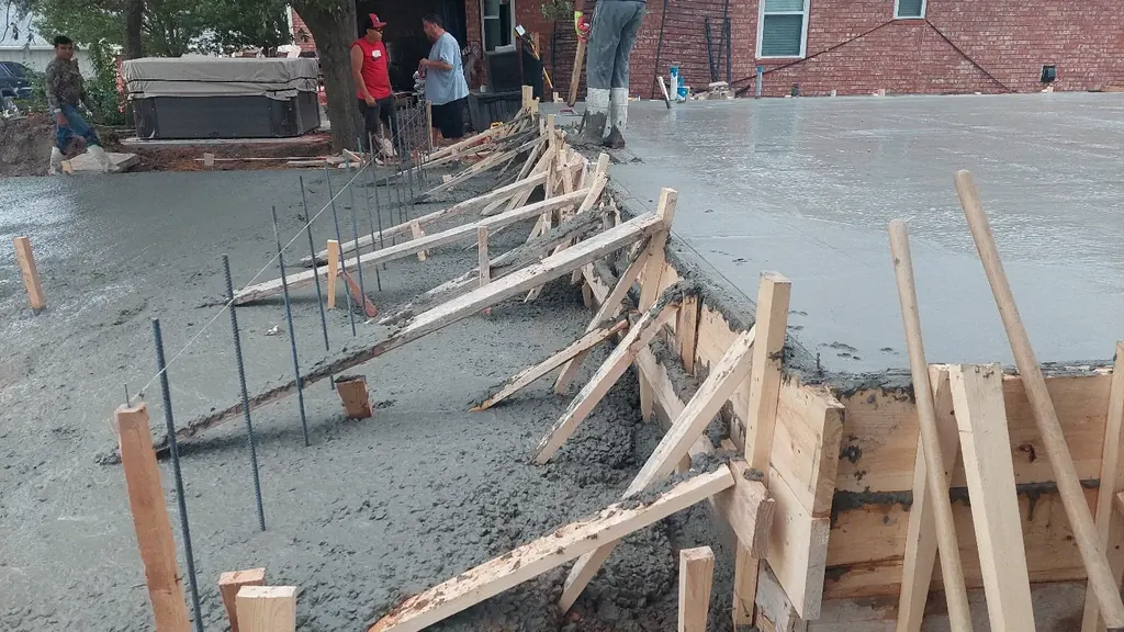 Forms for concrete steps beside a fresh pour