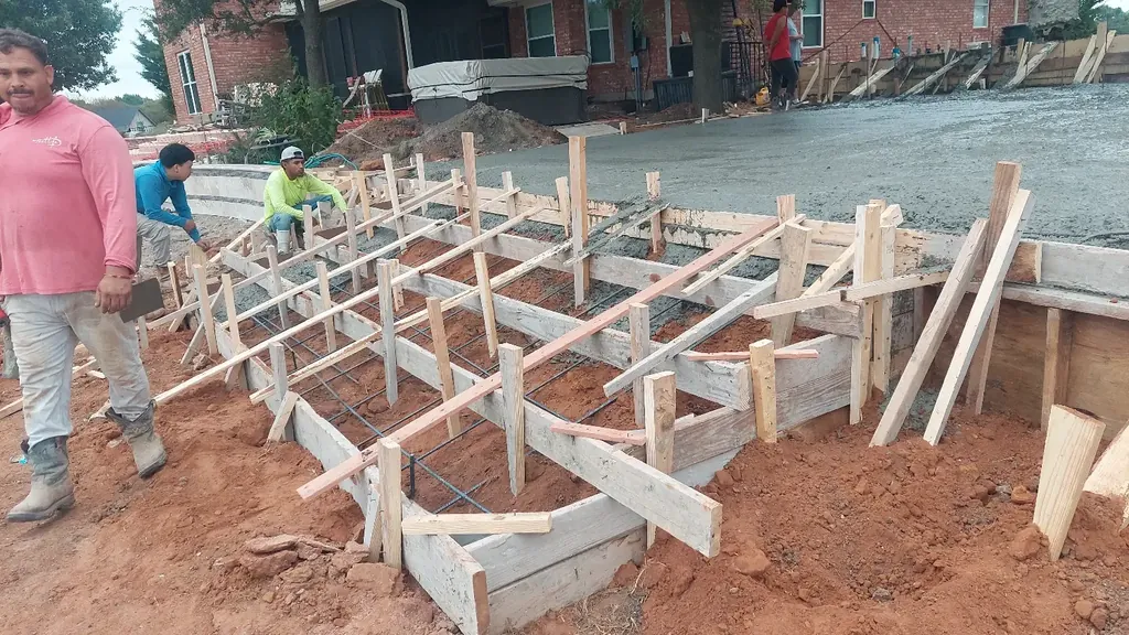 Crew building forms for concrete steps