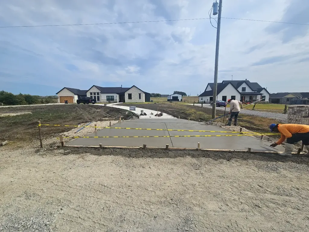 Crew forming a driveway (in progress)