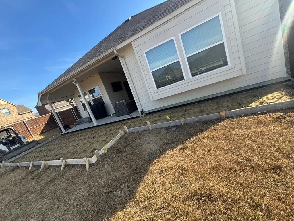 Patio forms set behind a home