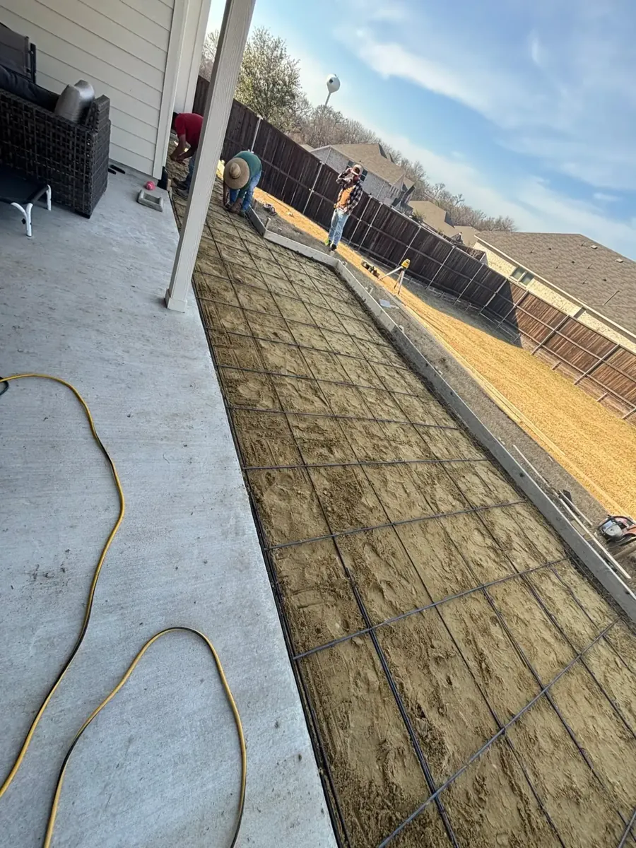 Rebar set alongside an existing slab