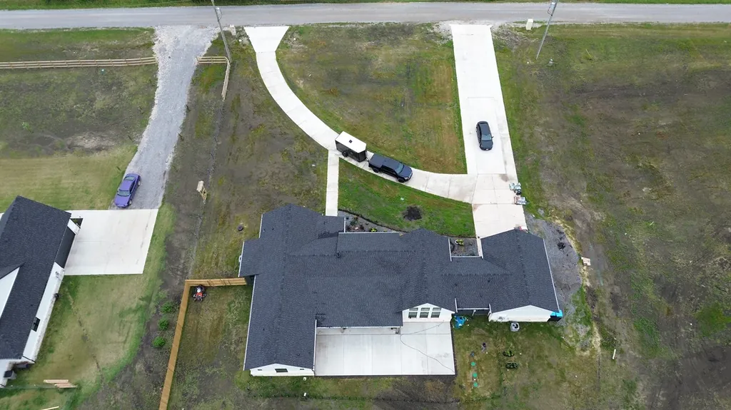 Driveway and walkway at a new home (aerial)